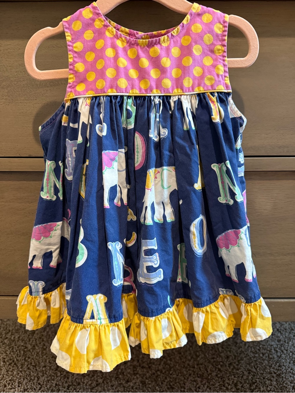 Eleanor Rose Navy Elephant Print Dress with Pink Polka Yoke and Yellow Ruffle
